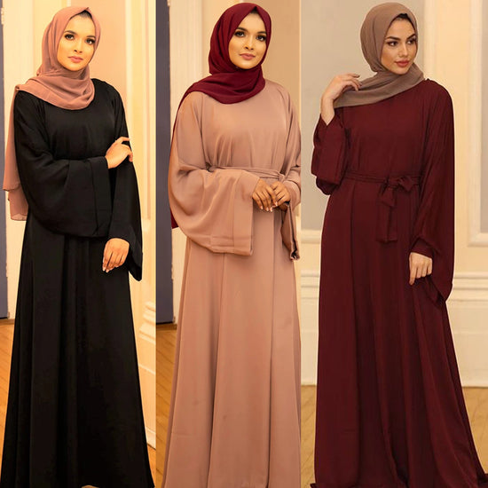 "Modest Chic: Muslim Female Dress for Fashionable Elegance"